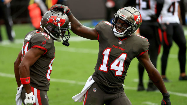 TAMPA, FLORIDA - JANUARY 03: Antonio Brown #81 of the Tampa Bay Buccaneers celebrates a touchdown with Chris Godwin #14 during a game against the Atlanta Falcons at Raymond James Stadium on January 03, 2021 in Tampa, Florida.