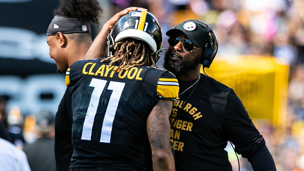 PITTSBURGH, PA - OCTOBER 10: Pittsburgh Steelers head coach Mike Tomlin pats Pittsburgh Steelers wide receiver Chase Claypool (11) on the helmet after scoring a touchdown during the game against the Denver Broncos and the Pittsburgh Steelers on October 10, 2021 at Heinz Field in Pittsburgh, PA.