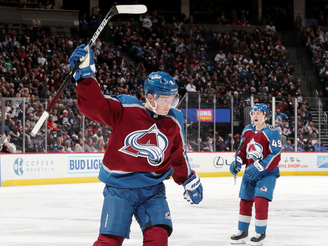 DENVER, COLORADO - NOVEMBER 22: Cale Makar #8 of the Colorado Avalanche celebrates a goal against the Ottawa Senators at Ball Arena on November 22, 2021 in Denver, Colorado.