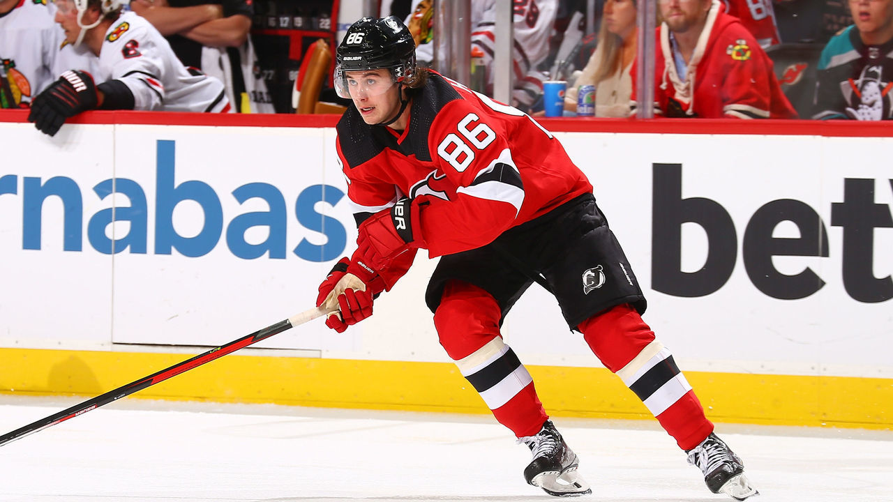 NEWARK, NEW JERSEY - OCTOBER 15: Jack Hughes #86 of the New Jersey Devils in action against the Chicago Blackhawks at Prudential Center on October 15, 2021 in Newark, New Jersey. New Jersey Devils defeated the Chicago Blackhawks 4-3 in OT.