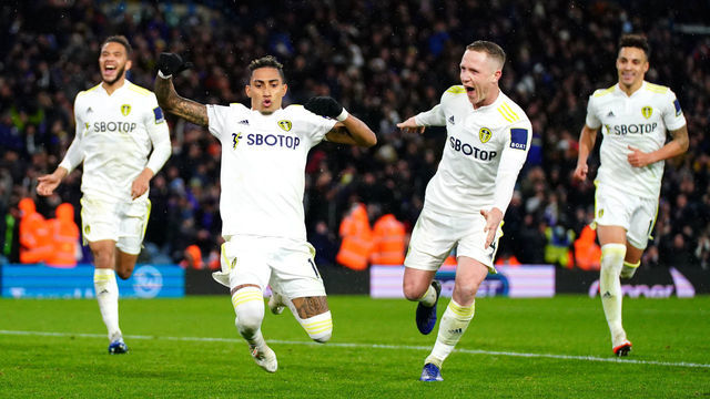 Leeds United's Raphinha (second left) celebrates scoring their side's first goal of the game during the Premier League match at Elland Road, Leeds. Picture date: Tuesday November 30, 2021.