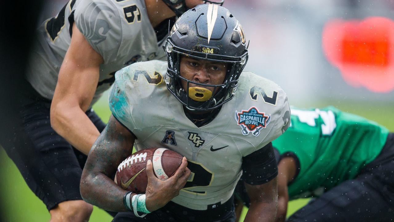 TAMPA, FL - DECEMBER 23: University of Central Florida running back Otis Anderson (2) runs during the Gasparilla Bowl between the University of Central Florida Knights and the Marshall Thundering Herd on December 23, 2019 at Raymond James Stadium in Tampa, FL.