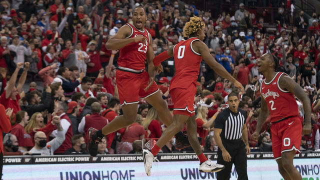 COLUMBUS, OH - NOVEMBER 30: Ohio State Buckeyes forward E.J. Liddell #32 and Ohio State Buckeyes guard Meechie Johnson Jr. #0 celebrate after the game between the Ohio State Buckeyes and the Duke Blue Devils at Value City Arena in Columbus, Ohio on November 30, 2021. Ohio State Buckeyes won 71-66.