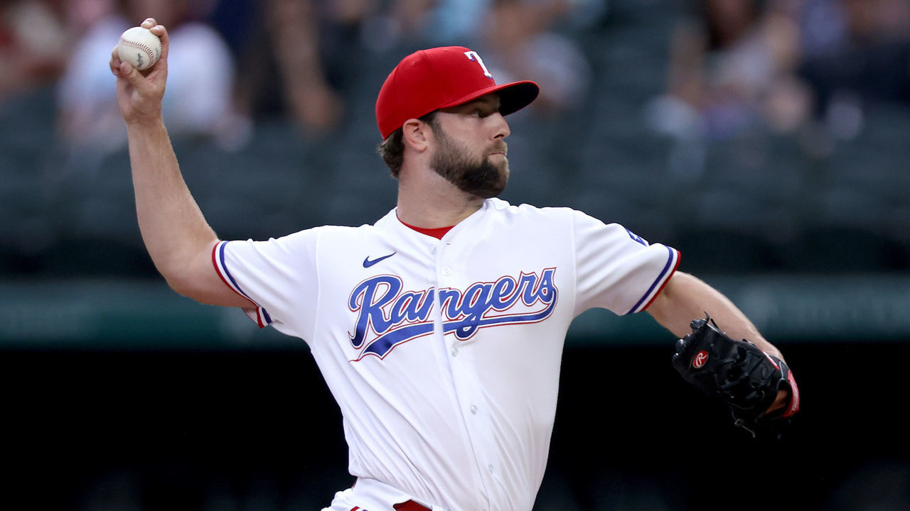 ARLINGTON, TEXAS - OCTOBER 02: Jordan Lyles #24 of the Texas Rangers pitches against the Cleveland Indians in the top of the first inning at Globe Life Field on October 02, 2021 in Arlington, Texas.