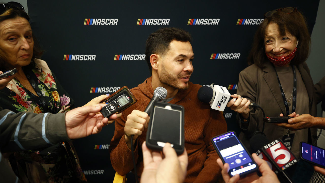 NASHVILLE, TENNESSEE - DECEMBER 02: NASCAR driver Kyle Larson speaks with the media prior to the NASCAR Champion's Banquet at Music City Center on December 02, 2021 in Nashville, Tennessee.