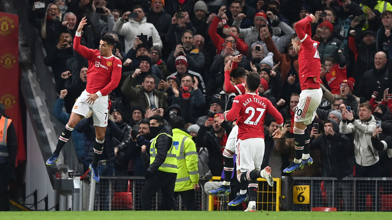 MANCHESTER, ENGLAND - DECEMBER 02: Cristiano Ronaldo of Manchester United celebrates after scoring their side's third goal during the Premier League match between Manchester United and Arsenal at Old Trafford on December 02, 2021 in Manchester, England.