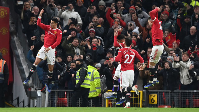 MANCHESTER, ENGLAND - DECEMBER 02: Cristiano Ronaldo of Manchester United celebrates after scoring their side's third goal during the Premier League match between Manchester United and Arsenal at Old Trafford on December 02, 2021 in Manchester, England.