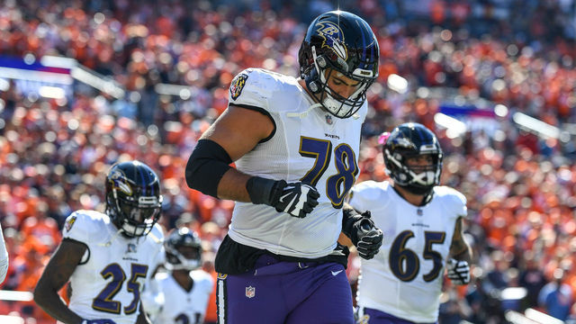 DENVER, CO - OCTOBER 3: Alejandro Villanueva #78 of the Baltimore Ravens runs onto the field before a game against the Denver Broncos at Empower Field at Mile High on October 3, 2021 in Denver, Colorado.
