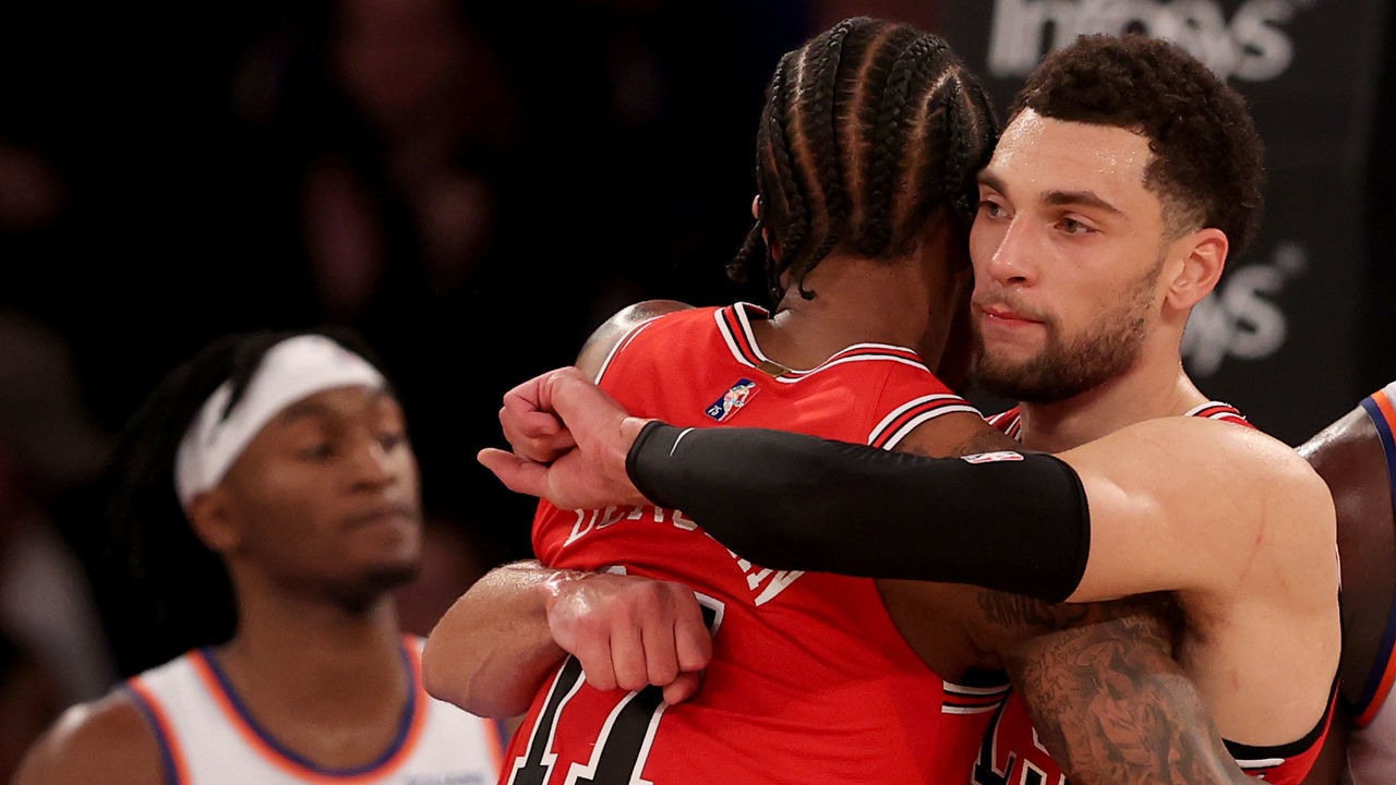 NEW YORK, NEW YORK - DECEMBER 02: Zach LaVine #8 and DeMar DeRozan #11 of the Chicago Bulls celebrate the win as Immanuel Quickley #5 of the New York Knicks walks off the court after the game at Madison Square Garden on December 02, 2021 in New York City. The Chicago Bulls defeated the New York Knicks 199-115.