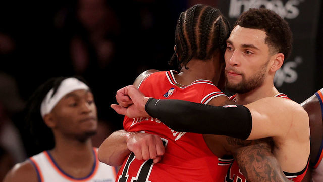 NEW YORK, NEW YORK - DECEMBER 02: Zach LaVine #8 and DeMar DeRozan #11 of the Chicago Bulls celebrate the win as Immanuel Quickley #5 of the New York Knicks walks off the court after the game at Madison Square Garden on December 02, 2021 in New York City. The Chicago Bulls defeated the New York Knicks 199-115.