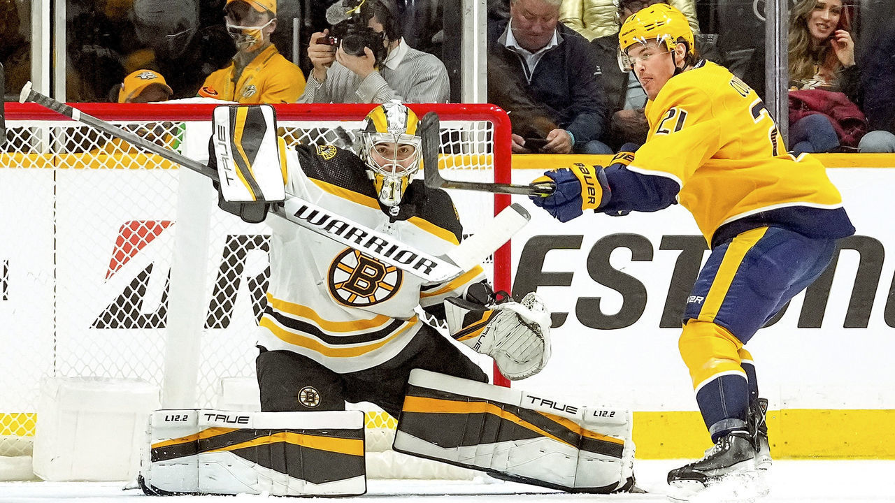 NASHVILLE, TN - DECEMBER 2: Jeremy Swayman #1 of the Boston Bruins makes the save against Nick Cousins #21 of the Nashville Predators during an NHL game at Bridgestone Arena on December 2, 2021 in Nashville, Tennessee.