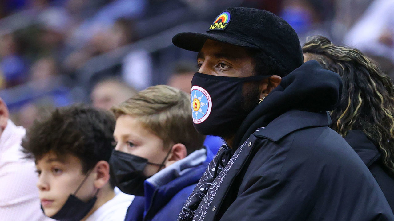 NEWARK, NJ - DECEMBER 01: Brooklyn Nets' Kyrie Irving watches the action during the second half of the college basketball game between the Seton Hall Pirates and the Wagner Seahawks on December 1, 2021 at the Prudential Center in Newrk, NJ.