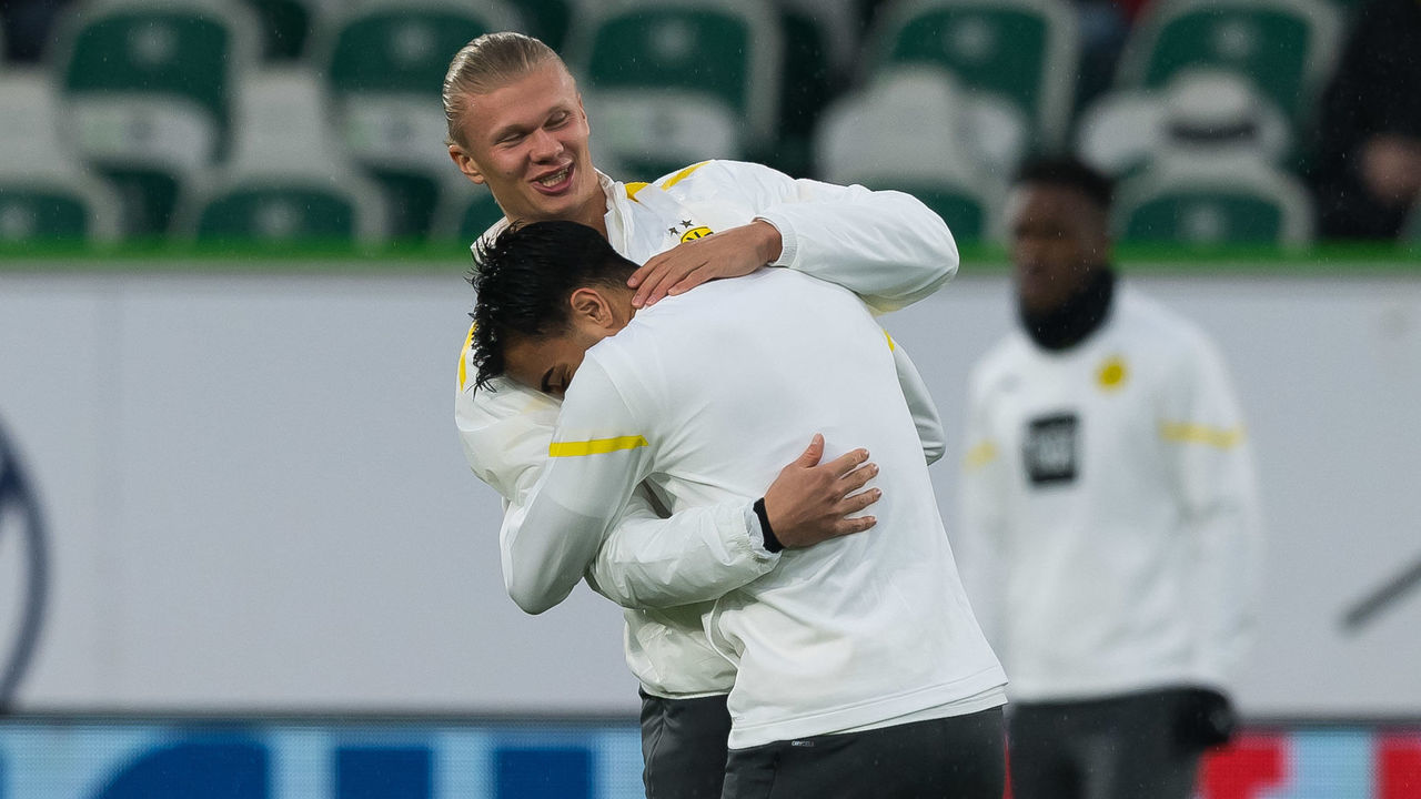 WOLFSBURG, GERMANY - NOVEMBER 27: (BILD OUT) Erling Haaland of Borussia Dortmund laughs prior to the Bundesliga match between VfL Wolfsburg and Borussia Dortmund at Volkswagen Arena on November 27, 2021 in Wolfsburg, Germany.