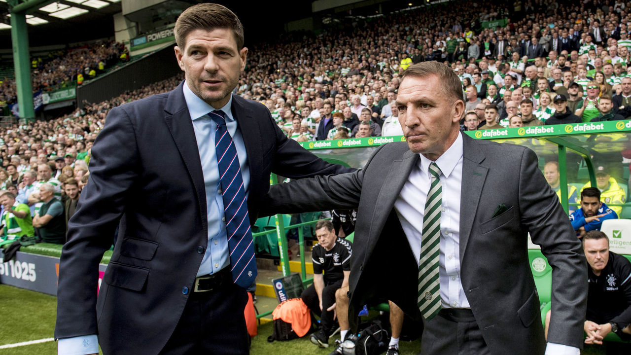 02/09/18 LADBROKES PREMIERSHIP.CELTIC V RANGERS.CELTIC PARK - GLASGOW .Rangers manager Steven Gerrard (left) shakes hands with Celtic manager Brendan Rodgers
