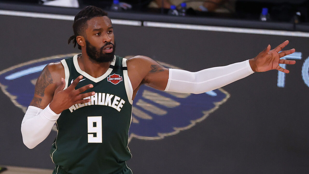 LAKE BUENA VISTA, FLORIDA - AUGUST 08: Wesley Matthews #9 of the Milwaukee Bucks reacts after hitting a three point basket against the Dallas Mavericks during the fourth quarter at The Arena at ESPN Wide World Of Sports Complex on August 08, 2020 in Lake Buena Vista, Florida.
