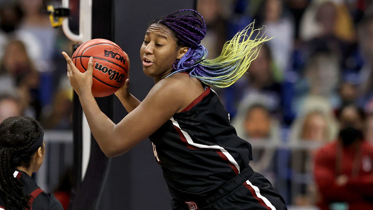SAN ANTONIO, TEXAS - APRIL 02: Aliyah Boston #4 of the South Carolina Gamecocks grabs the rebound in the first half against the Stanford Cardinal in the Final Four semifinal game of the 2021 NCAA Women's Basketball Tournament at the Alamodome on April 02, 2021 in San Antonio, Texas.