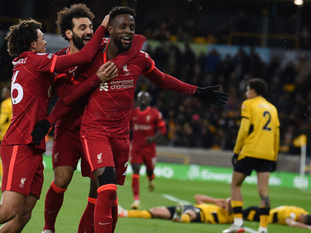 WOLVERHAMPTON, ENGLAND - DECEMBER 04: ( THE SUN OUT,THE SUN ON SUNDAY OUT ) Divock Origi of Liverpool celebrates after scoring the first goal during the Premier League match between Wolverhampton Wanderers and Liverpool at Molineux on December 04, 2021 in Wolverhampton, England.