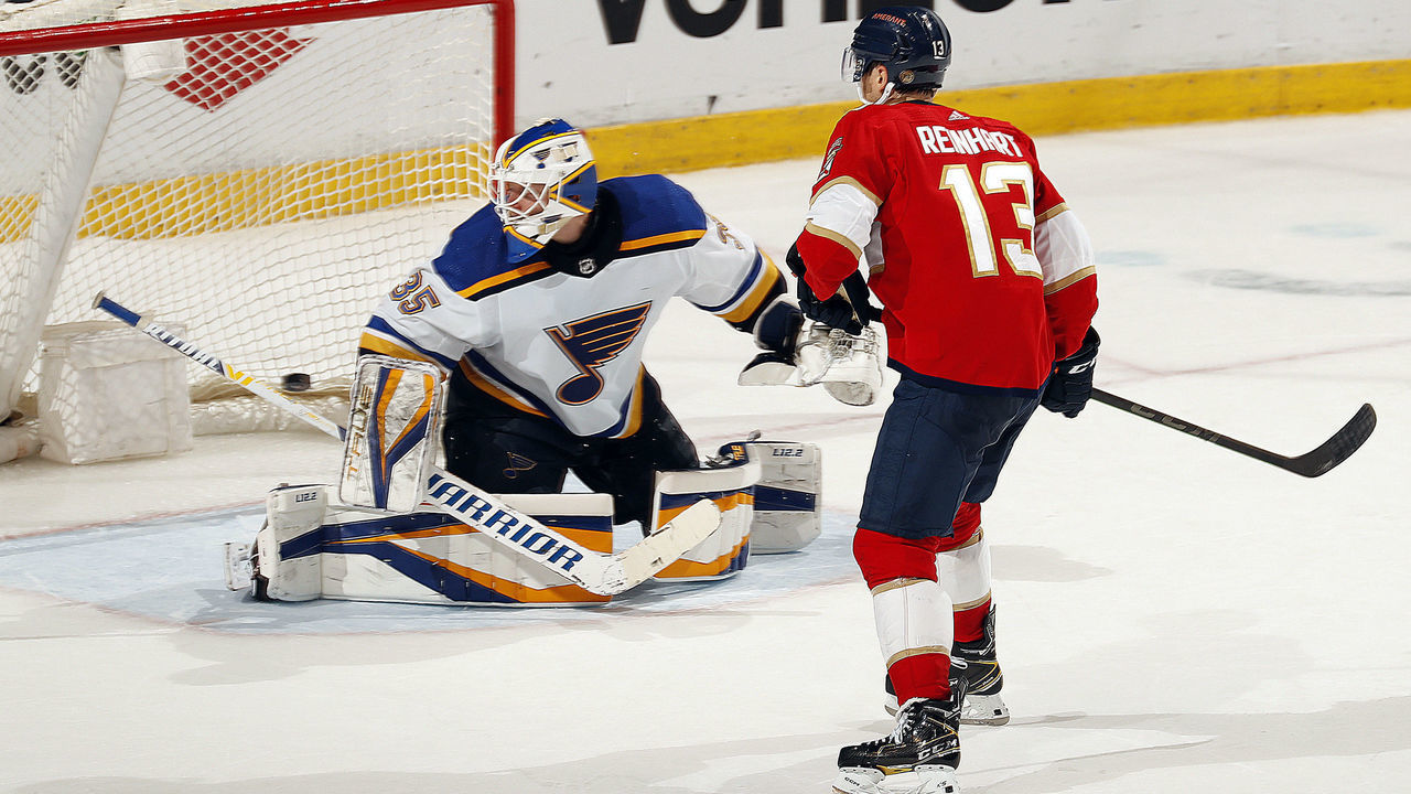 SUNRISE, FL - DECEMBER 4: Sam Reinhart #13 of the Florida Panthers shoots and scores in a shoot out for the win against Goaltender Ville Husso #35 of the St. Louis Blues at the FLA Live Arena on December 4, 2021 in Sunrise, Florida.