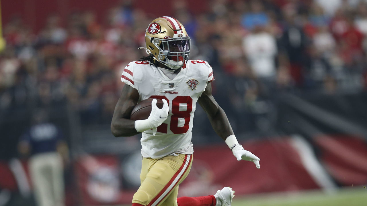 GLENDALE, AZ - OCTOBER 10: Trey Sermon #28 of the San Francisco 49ers rushes during the game against the Arizona Cardinals at State Farm Stadium on October 10, 2021 in Glendale, Arizona. The Cardinals defeated the 49ers 17-10.