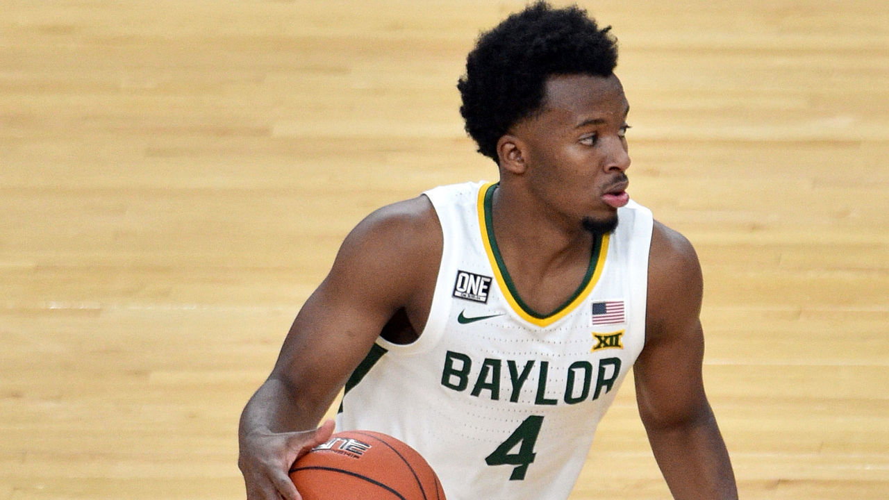 LAS VEGAS, NEVADA - NOVEMBER 28: L.J. Cryer #4 of the Baylor Bears controls the ball against the Louisiana Ragin' Cajuns in the first half of their game during the #VegasBubble basketball tournament at T-Mobile Arena on November 28, 2020 in Las Vegas, Nevada. Baylor won 112-82.