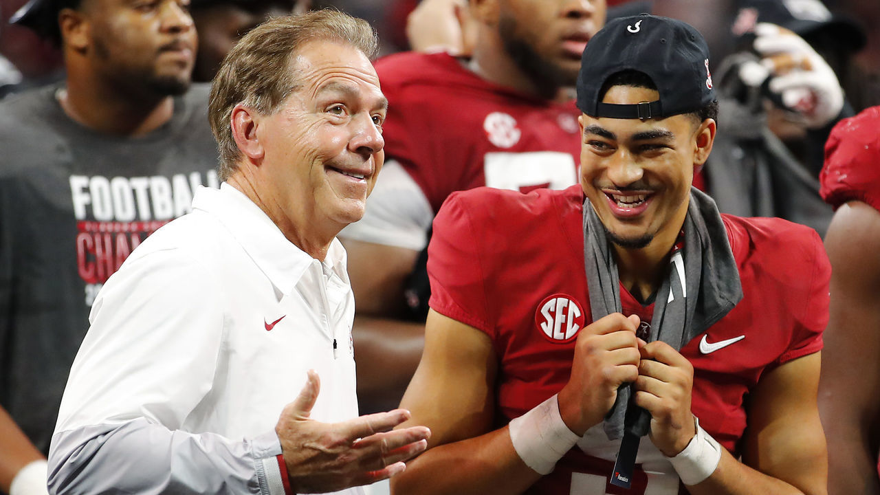 ATLANTA, GEORGIA - DECEMBER 04: Head coach Nick Saban of the Alabama Crimson Tide and Bryce Young #9 of the Alabama Crimson Tide celebrate their win against the Georgia Bulldogs after the SEC Championship game at Mercedes-Benz Stadium on December 04, 2021 in Atlanta, Georgia.