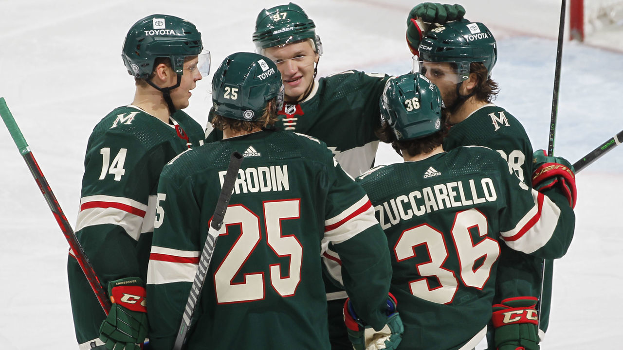 ST. PAUL, MN - DECEMBER 4: The Minnesota Wild celebrate after Mats Zuccarello #36 scored a power play goal against the Toronto Maple Leafs in the second period of the game at Xcel Energy Center on December 4, 2021 in St. Paul, Minnesota.