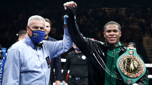 LAS VEGAS, NEVADA - DECEMBER 04: WBC lightweight champion Devin Haney poses with referee Russell Mora after defeating Joseph Diaz Jr. in a title fight at MGM Grand Garden Arena on December 04, 2021 in Las Vegas, Nevada. Haney retained his titles with a unanimous decision.