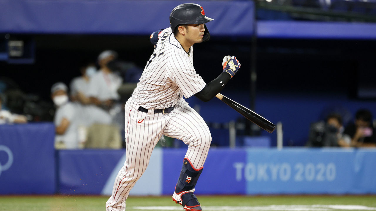 YOKOHAMA, JAPAN - AUGUST 07: Outfielder Seiya Suzuki #51 of Team Japan hits a single in the six during the gold medal game between Team United States and Team Japan on day fifteen of the Tokyo 2020 Olympic Games at Yokohama Baseball Stadium on August 07, 2021 in Yokohama, Kanagawa, Japan.