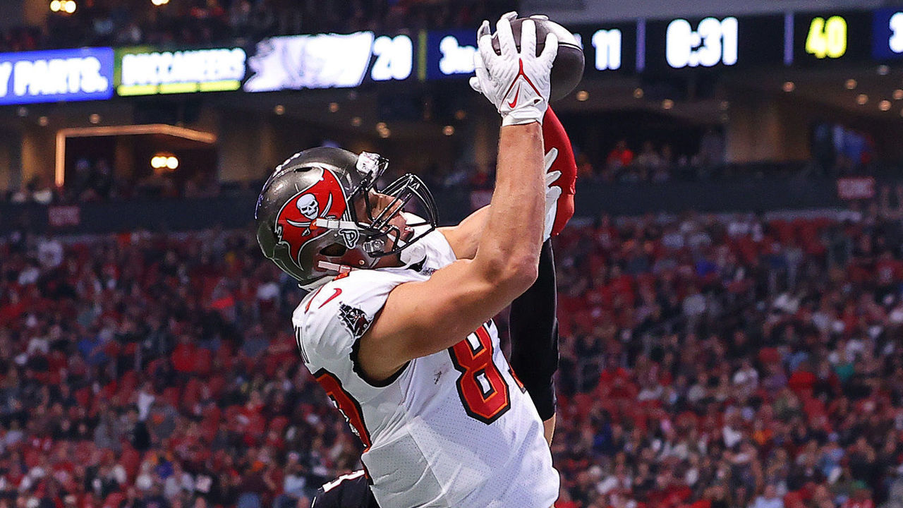 ATLANTA, GEORGIA - DECEMBER 05: Rob Gronkowski #87 of the Tampa Bay Buccaneers catches a touchdown pass against the Atlanta Falcons during the third quarter at Mercedes-Benz Stadium on December 05, 2021 in Atlanta, Georgia.