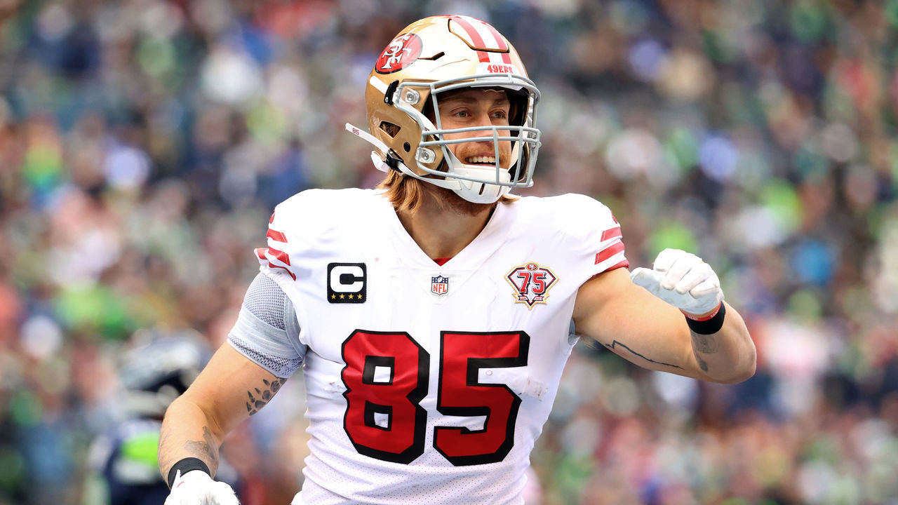 SEATTLE, WASHINGTON - DECEMBER 05: George Kittle #85 of the San Francisco 49ers celebrates after catching the ball for a touchdown during the first quarter against the Seattle Seahawks at Lumen Field on December 05, 2021 in Seattle, Washington.