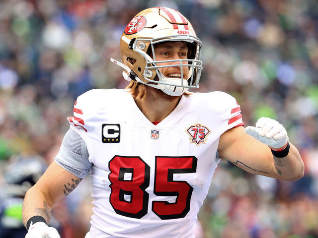 SEATTLE, WASHINGTON - DECEMBER 05: George Kittle #85 of the San Francisco 49ers celebrates after catching the ball for a touchdown during the first quarter against the Seattle Seahawks at Lumen Field on December 05, 2021 in Seattle, Washington.