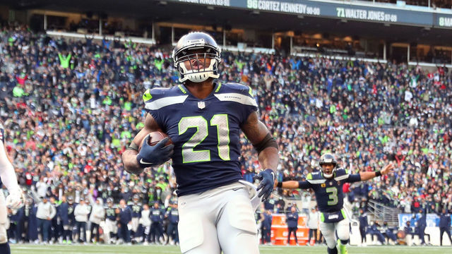 SEATTLE, WASHINGTON - DECEMBER 05: Adrian Peterson #21 of the Seattle Seahawks runs the ball for a touchdown during the second quarter against the San Francisco 49ers at Lumen Field on December 05, 2021 in Seattle, Washington.