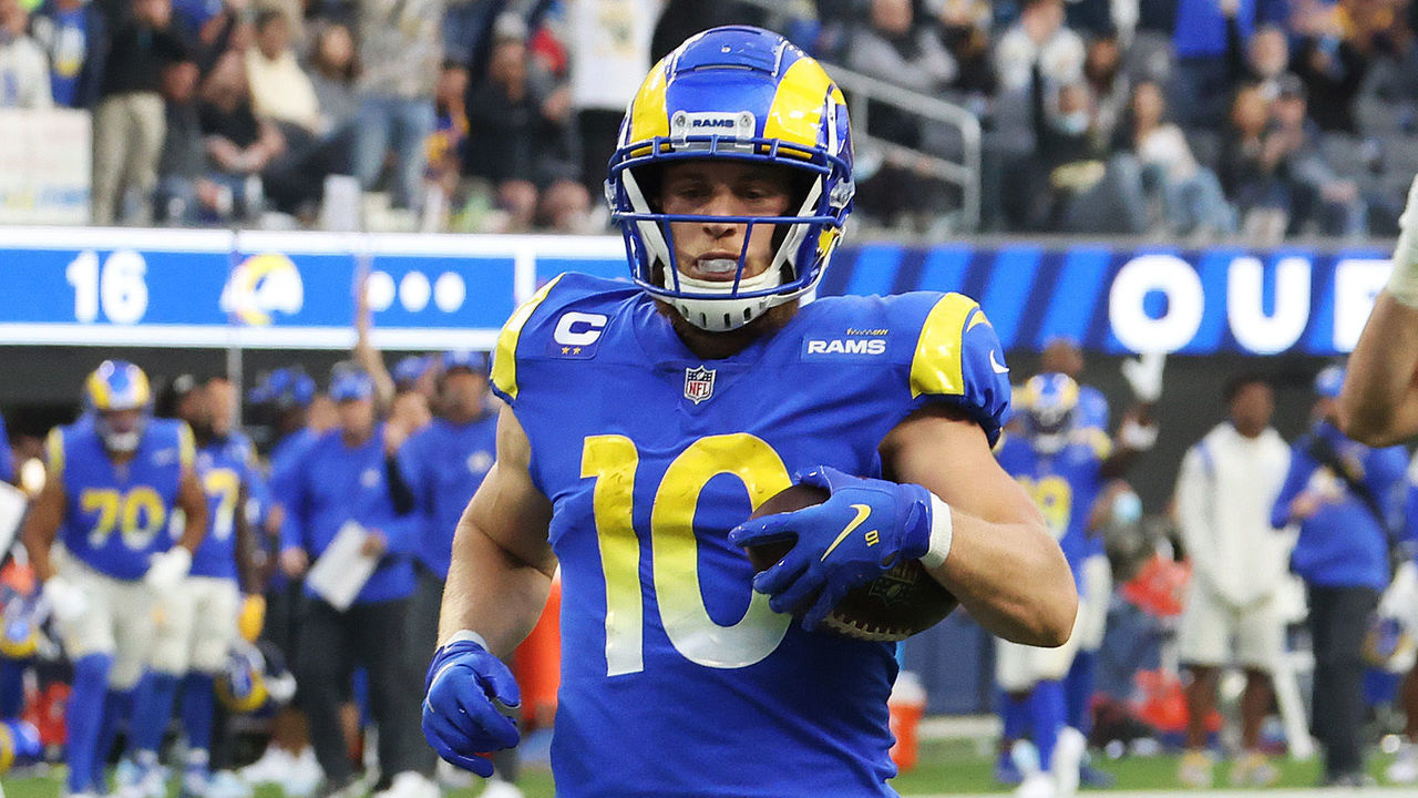 INGLEWOOD, CALIFORNIA - DECEMBER 05: Cooper Kupp #10 of the Los Angeles Rams carries the ball after a reception for a touchdown in the third quarter against the Jacksonville Jaguars at SoFi Stadium on December 05, 2021 in Inglewood, California.