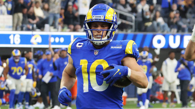 INGLEWOOD, CALIFORNIA - DECEMBER 05: Cooper Kupp #10 of the Los Angeles Rams carries the ball after a reception for a touchdown in the third quarter against the Jacksonville Jaguars at SoFi Stadium on December 05, 2021 in Inglewood, California.