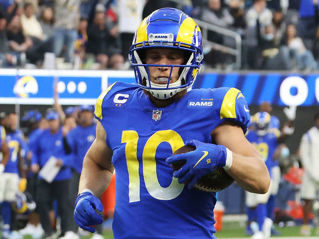 INGLEWOOD, CALIFORNIA - DECEMBER 05: Cooper Kupp #10 of the Los Angeles Rams carries the ball after a reception for a touchdown in the third quarter against the Jacksonville Jaguars at SoFi Stadium on December 05, 2021 in Inglewood, California.