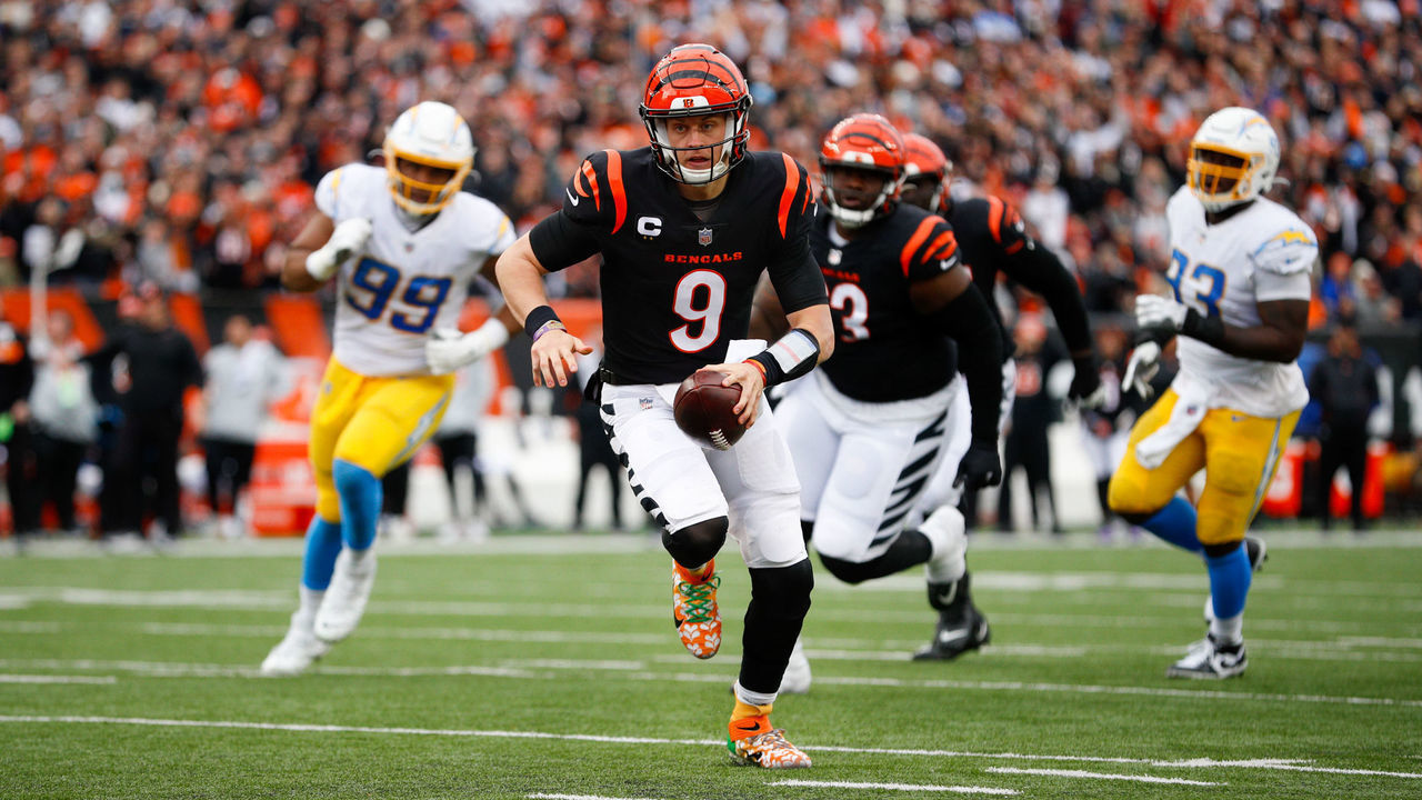 CINCINNATI, OH - DECEMBER 05: Cincinnati Bengals quarterback Joe Burrow (9) carries the ball for a touchdown during the game against the Los Angeles Chargers and the Cincinnati Bengals on December 5, 2021, at Paul Brown Stadium in Cincinnati, OH.