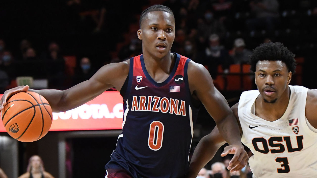 CORVALLIS, OR - DECEMBER 05: Arizona Wildcats guard Bennedict Mathurin (0) dribbles forward against Oregon State Beavers guard Dexter Akanno (3) during a PAC-12 conference basketball game between the Arizona Wildcats and Oregon State Beavers on December 5, 2021 at Gill Coliseum in Corvallis, Oregon.