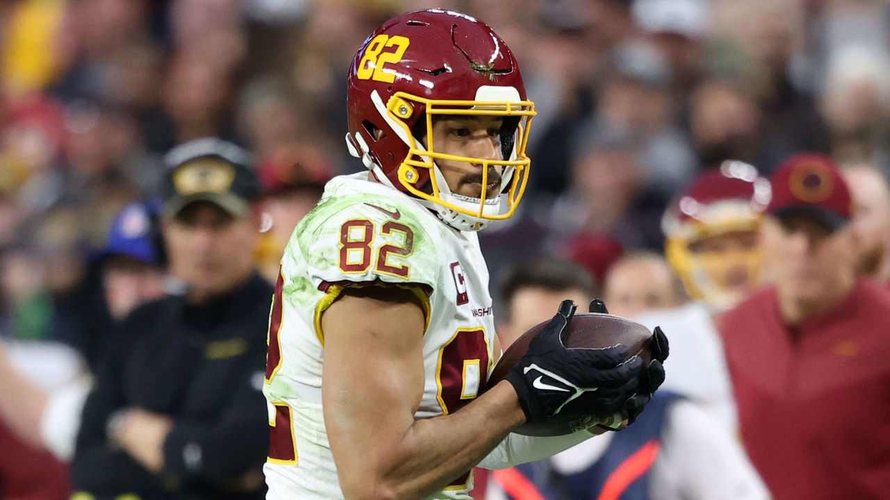 LAS VEGAS, NEVADA - DECEMBER 05: Logan Thomas #82 of the Washington Football Team runs with the ball after the catch against the Las Vegas Raiders during the third quarter at Allegiant Stadium on December 05, 2021 in Las Vegas, Nevada.