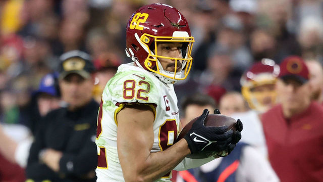 LAS VEGAS, NEVADA - DECEMBER 05: Logan Thomas #82 of the Washington Football Team runs with the ball after the catch against the Las Vegas Raiders during the third quarter at Allegiant Stadium on December 05, 2021 in Las Vegas, Nevada.