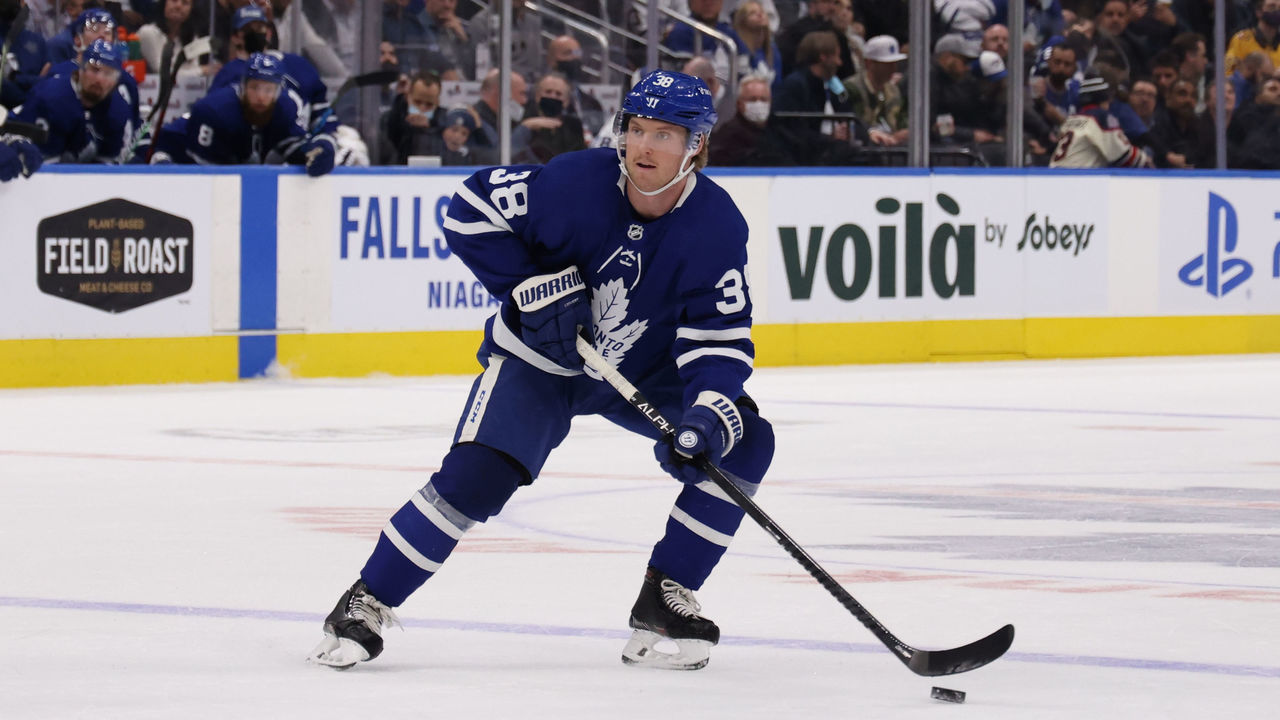TORONTO, ON - NOVEMBER 16: Toronto Maple Leafs Defenceman Rasmus Sandin (38) carries the puck along the point in the third period during the NHL regular season game between the Nashville Predators and the Toronto Maple Leafs on November 16, 2021, Scotiabank Arena in Toronto, ON, Canada.