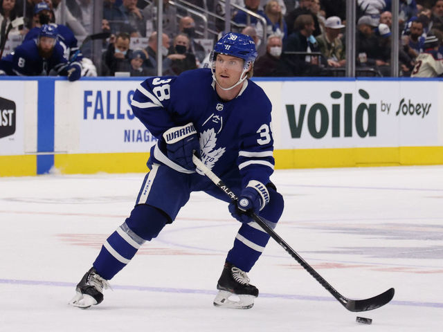 TORONTO, ON - NOVEMBER 16: Toronto Maple Leafs Defenceman Rasmus Sandin (38) carries the puck along the point in the third period during the NHL regular season game between the Nashville Predators and the Toronto Maple Leafs on November 16, 2021, Scotiabank Arena in Toronto, ON, Canada.