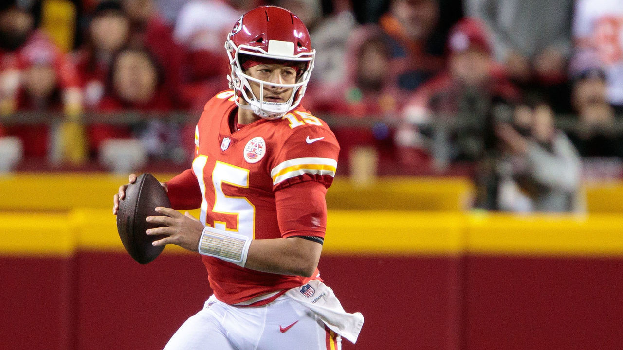 KANSAS CITY, MO - DECEMBER 05: Kansas City Chiefs quarterback Patrick Mahomes (15) scrambles in the back field against the Denver Broncos on December 5th, 2021 at Arrowhead Stadium in Kansas City, Missouri.