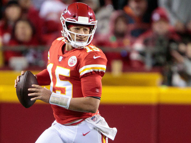 KANSAS CITY, MO - DECEMBER 05: Kansas City Chiefs quarterback Patrick Mahomes (15) scrambles in the back field against the Denver Broncos on December 5th, 2021 at Arrowhead Stadium in Kansas City, Missouri.