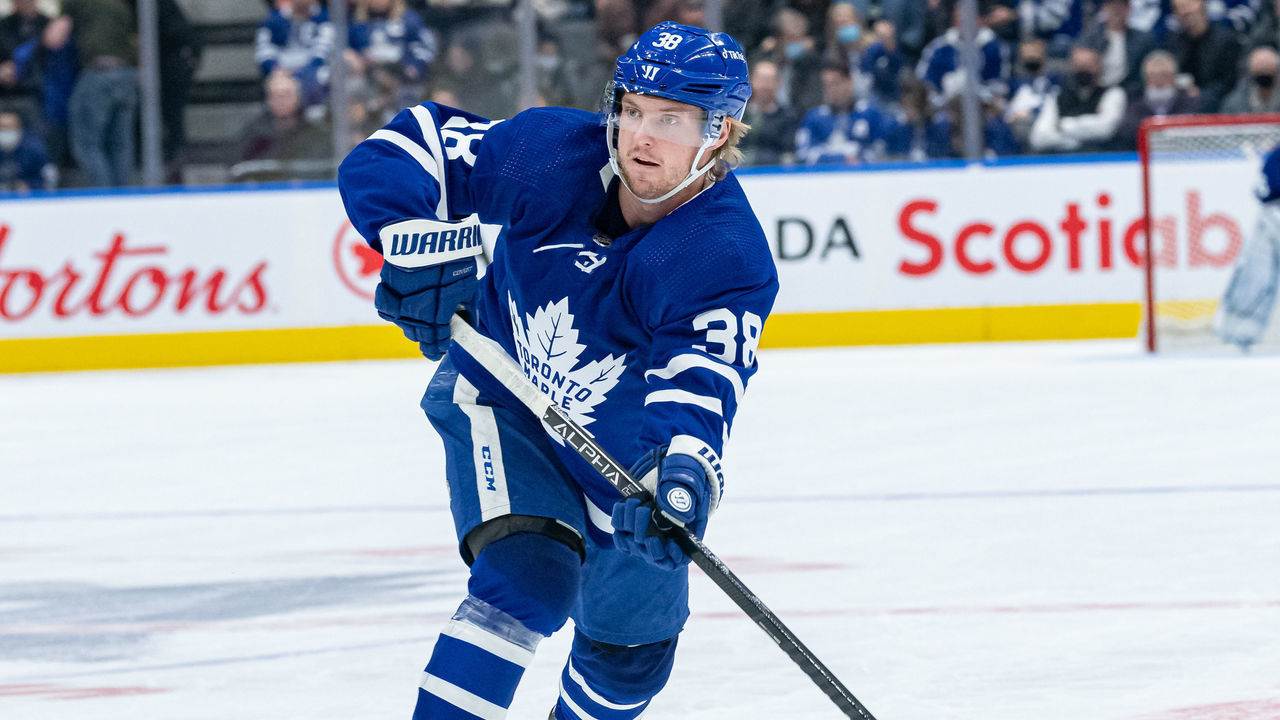 TORONTO, ON - DECEMBER 01: Toronto Maple Leafs Defenceman Rasmus Sandin (38) passes the puck during the NHL regular season game between the Colorado Avalanche and the Toronto Maple Leafs on December 1, 2021, at Scotiabank Arena in Toronto, ON, Canada.