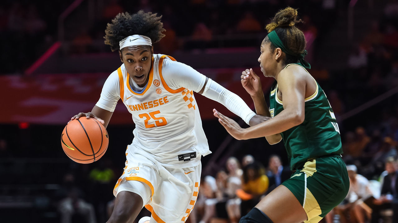 KNOXVILLE, TN - NOVEMBER 15: Tennessee Lady Vols guard Jordan Horston (25) drives around South Florida Bulls guard Sydni Harvey (3) in a game between the Tennessee Lady Vols and the South Florida Bulls on November 15, 2021, at Thompson-Boling Arena in Knoxville, TN.
