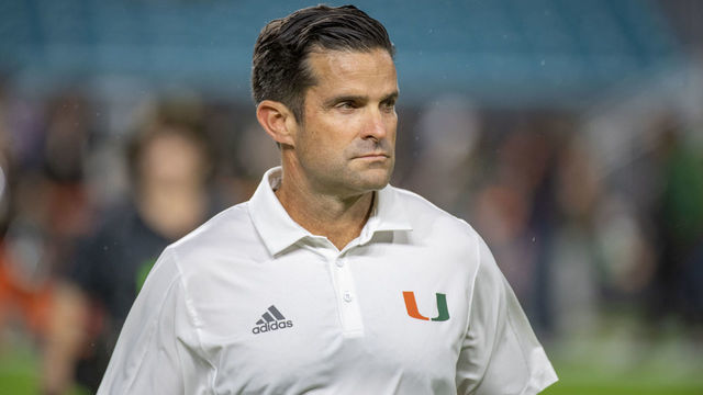 MIAMI GARDENS, FL - NOVEMBER 20: Miami head coach Manny Diaz on the field before the start of the college football game against the Virginia Tech Hokies on November 20, 2021 at the Hard Rock Stadium in Miami Gardens, FL.