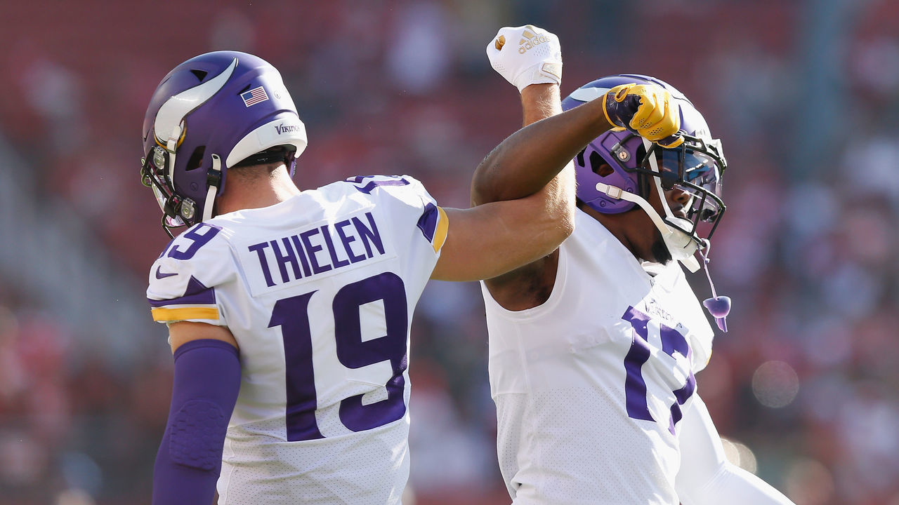 SANTA CLARA, CALIFORNIA - NOVEMBER 28: K.J. Osborn #17 and Adam Thielen #19 of the Minnesota Vikings and warms up before the game against the San Francisco 49ers at Levi's Stadium on November 28, 2021 in Santa Clara, California.