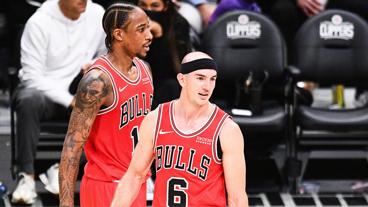 LOS ANGELES, CA - NOVEMBER 14: Chicago Bulls Guard Alex Caruso (6) and Chicago Bulls Forward DeMar DeRozan (11) look on during a NBA game between the Chicago Bulls and the Los Angeles Clippers on November 14, 2021 at STAPLES Center in Los Angeles, CA.