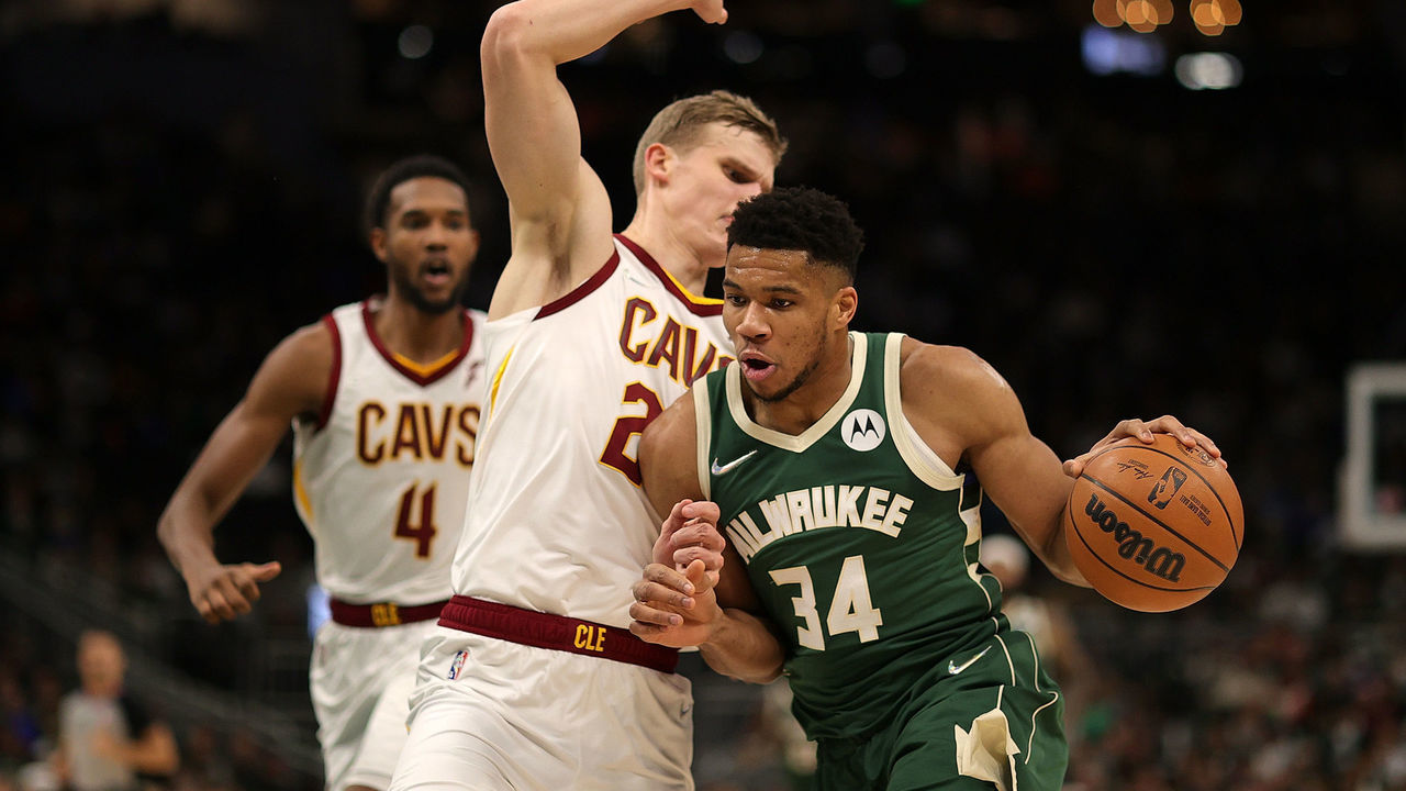 MILWAUKEE, WISCONSIN - DECEMBER 06: Giannis Antetokounmpo #34 of the Milwaukee Bucks is defended by Lauri Markkanen #24 of the Cleveland Cavaliers during a game at Fiserv Forum on December 06, 2021 in Milwaukee, Wisconsin.
