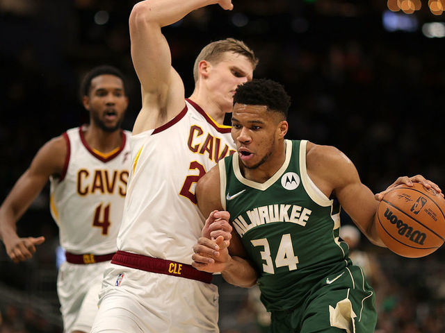 MILWAUKEE, WISCONSIN - DECEMBER 06: Giannis Antetokounmpo #34 of the Milwaukee Bucks is defended by Lauri Markkanen #24 of the Cleveland Cavaliers during a game at Fiserv Forum on December 06, 2021 in Milwaukee, Wisconsin.